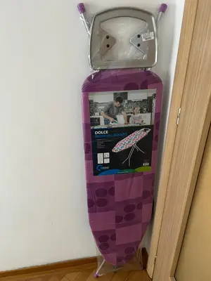 a purple fire hydrant with a picture of an umbrella at Vert Apartment in Banja Luka