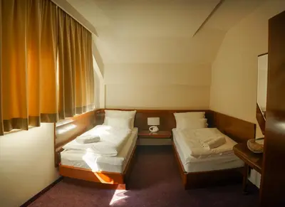 a small room with two beds and a window at Hotel Laktaši in Laktaši