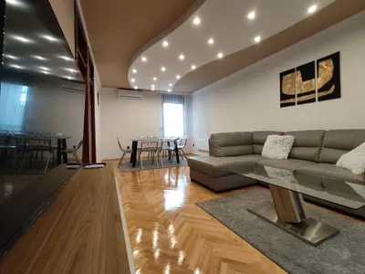 a living room with a couch and a table at Apartment Alex in Banja Luka