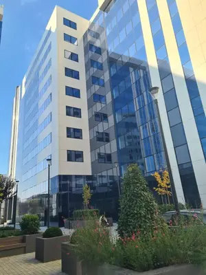 a tall building with a lot of windows at GRAND LUX APARTMENTS in Banja Luka