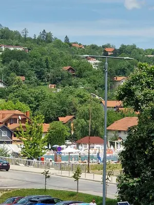 a view of a resort with a road and buildings at Square Studio Tuzla in Tuzla