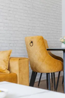 a dining room with two chairs and a table at Comfort Lux Residence in Banja Luka
