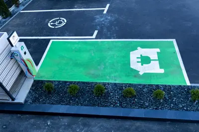 an aerial view of a parking lot with a toilet sign at Hotel Adriale in Kreševo