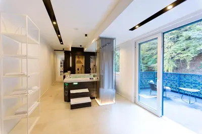 a bathroom with a tub and a sink at Hotel Adriale in Kreševo