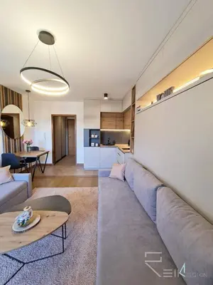 a living room with a couch and a table at Vlašićka ruža Eko FIS 303 in Vlasic