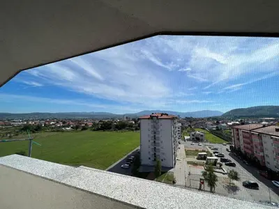 a view of a city from a window of a building at Unas apartment in Bihać
