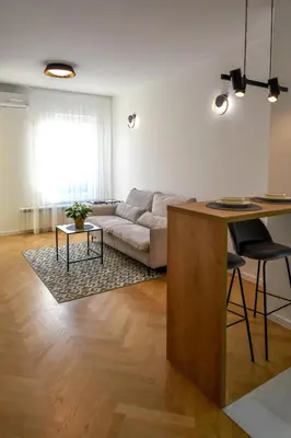 a living room with a couch and a table at Apartman Filip in Banja Luka