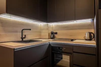 a kitchen with a sink and a stove at Madonna Sky in Kupres