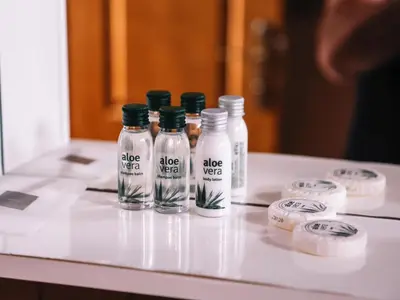a group of bottles sitting on top of a counter at Stara Ada Banja Luka in Banja Luka