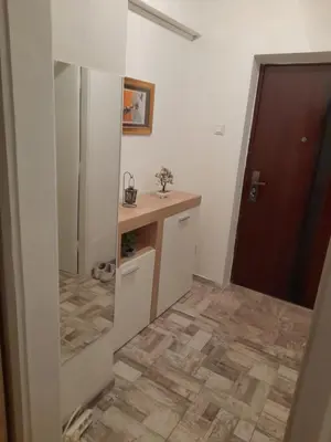 a bathroom with a sink and a counter top at Kineski zid in Zenica