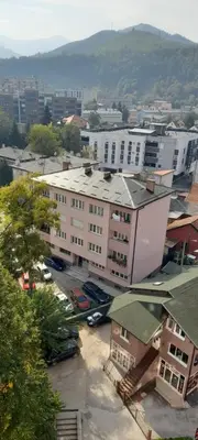an overhead view of a city with buildings at Kineski zid in Zenica