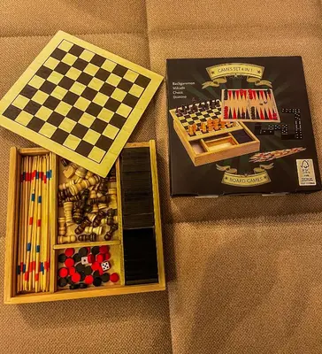 a toy chess set and a box of matches at Vila Bašić Vlašić Apartman VUK in Vlasic
