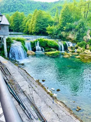 a view of a waterfall in a river at Villa TeslaS in Velika Kladuša