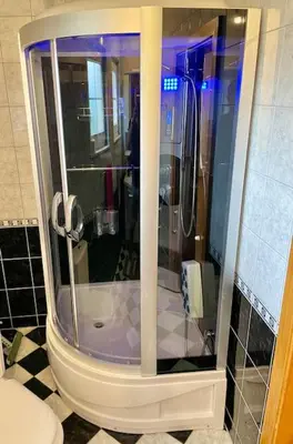 a bathroom with a shower and a toilet at Villa TeslaS in Velika Kladuša