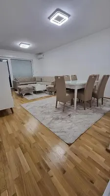 a dining room with a table and chairs at Visoko Prime Residence in Visoko