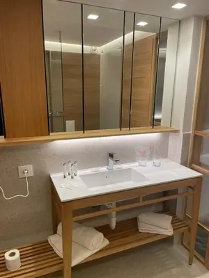a bathroom with a sink and a mirror at Lipa Hotel in Travnik