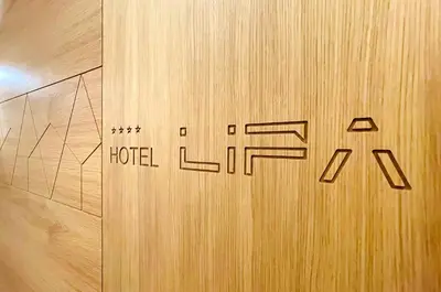 a sign on the door of a hotel at Lipa Hotel in Travnik