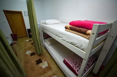 a bunk bed with towels on it in a room at Prenoćište KRAJINA in Velika Kladuša