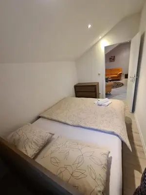 a bedroom with a large bed in a room at Čičak in Livno