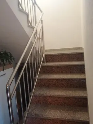 a set of stairs in a house at Apartman Vuvuzela in Kupres