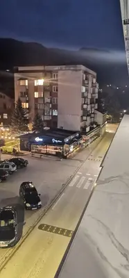 a view of a parking lot at night with cars at Sweet Dreams RD in Travnik