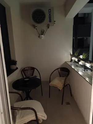 a small room with two chairs and a table at Apartman 7 Ladies in Banja Luka
