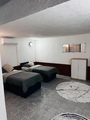 a hotel room with two beds in a room at Apart Cobras Jajce in Jajce