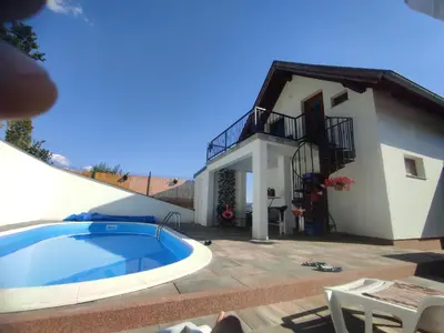 a villa with a swimming pool and a house at La Mia Casa in Bihać