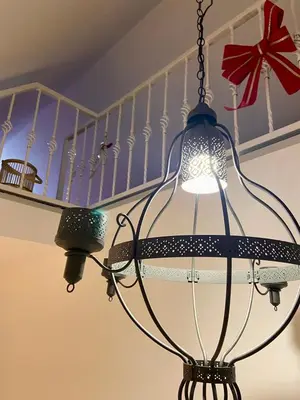 a light that is hanging from a ceiling at Farmhouse Dzeni in Vlasic