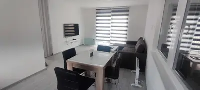 a dining room with a table and chairs at Perfect Holidays in Vlasic