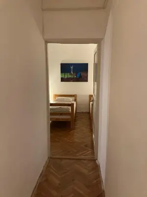 a hallway with a room with a bed in it at Penthouse stan 80m2, terasa 36m2, garaža... centar Banja Luke - gradski park in Banja Luka