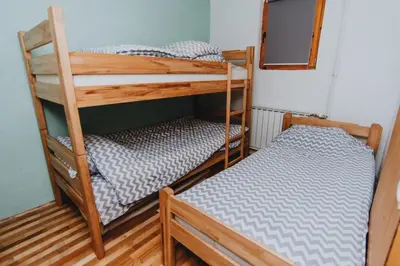a couple of bunk beds in a room at Apartments Kiki Vlašić in Vlasic