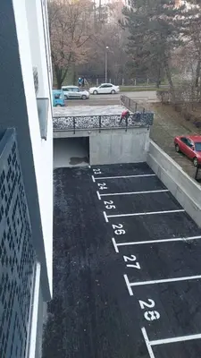 an overhead view of a parking lot with a bridge at Apartman Mia 2 Banja Luka in Banja Luka