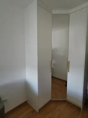 an empty room with white walls and a door at Alex LUX in Banja Luka