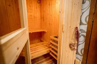 a small wooden sauna with a wooden floor at Kraljevsko selo Kotromanićevo in Doboj