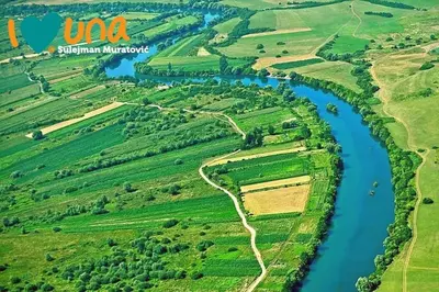 an aerial view of a river in the countryside at Watermill 102 - Apartment Krupana in Bosanska Krupa