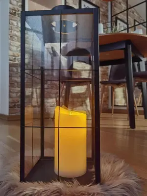 a glass case with a yellow object in it at Prestige Banja Luka in Banja Luka