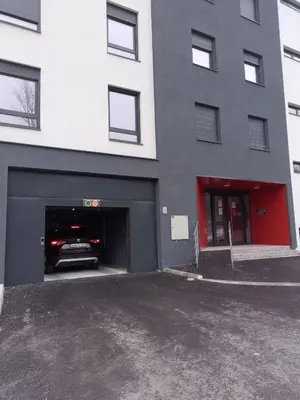 a car is driving into a parking garage at DAMI in Tuzla