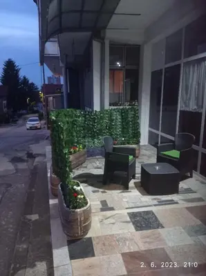 a building with plants on the side of a street at Studio apartman Sokak in Bihać