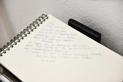 a piece of paper with writing on a phone at Stela1 in Drvar