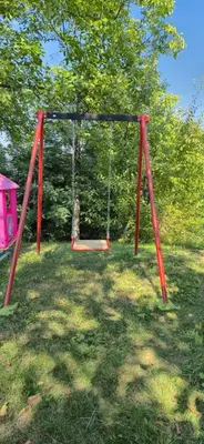a swing in a park with a yard at Dream weekend house in Visoko