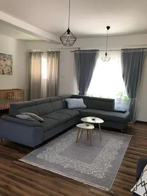 a living room with a couch and a table at Gracia in Jajce