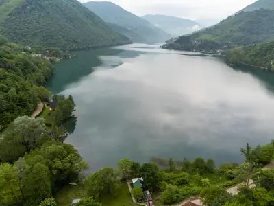 an aerial view of a lake in a valley at Jajce lake cottage-Plivsko jezero in Jajce