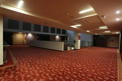 a view of a large room with a red carpet at Hotel Zenica in Zenica