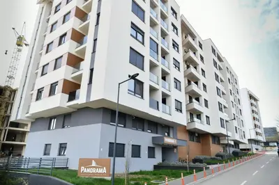 an apartment building with a white facade at Apartman Panorama Banja Luka in Banja Luka
