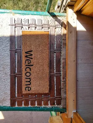 a mat with the word learning written on it at Hacienda Burzić in Kulen Vakuf