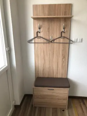 a wooden shelf with a bench in a room at Graciaa in Jajce