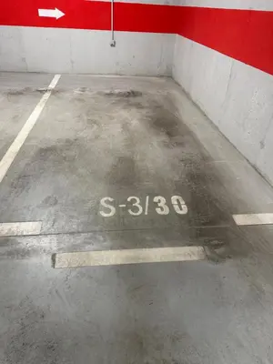 an empty parking lot with the words written on it at TOMAS LUX APARTMENTS in Banja Luka