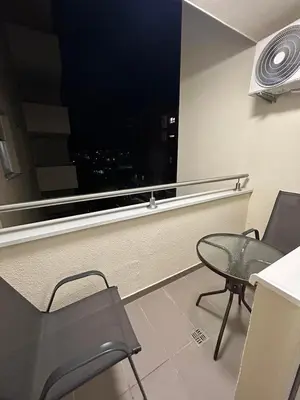 a room with a table and chairs and a window at ApartmanM&M in Banja Luka