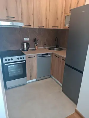 a kitchen with a stove and a sink at Apartman Vista Banja Luka in Banja Luka